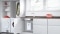 The picture shows Viessmann electric hot water systems under the kitchen sink.