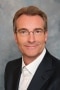 The image shows Karlheinz Reitze, managing director of PV+E-Systeme GmbH.
