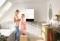 The image shows a mother and her daughter in a bathroom with Viessmann wall mounted appliance