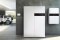 The image shows Vitovalor PT2 fuel cell heating device with Vitocharge VX3 power storage system (right) from Viessmann
