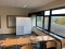 The image shows a Viessmann air purification unit in the classroom. 