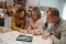 The image shows Laura Dahlmeier and her mother planning their Viessmann heating system.