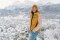 The image shows Laura Dahlmeier in a snowy landscape. 
