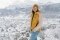 The image shows Laura Dahlmeier in a snowy landscape 