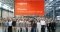 The image shows Viessmann employees in a production hall in Allendorf. 